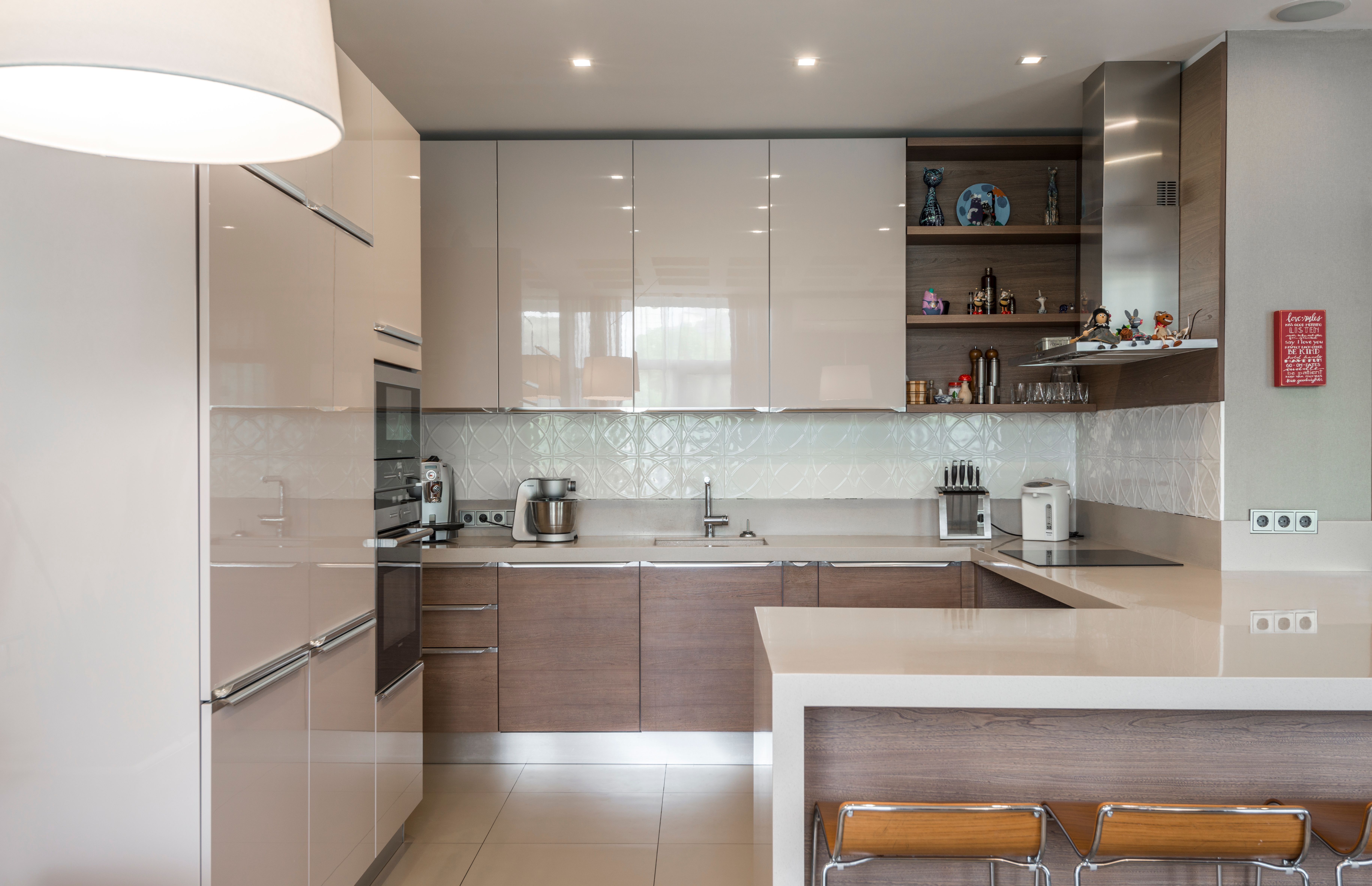 Renovated kitchen with modern cabinetry and stone surfaces